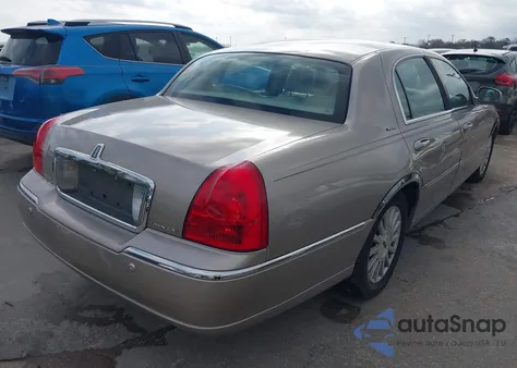 2003 Lincoln Town Car Signature z USA, uszkodzony, nr VIN 1LNHM82W63Y693150